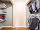 Spacious walk-in closet with adjustable shelving and ample storage space for clothes and accessories at 7629 Farm View W Cir, Indianapolis, IN 46256