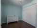 Bedroom with double door closet and wood floors at 8231 Spring Valley Dr, Plainfield, IN 46168