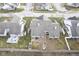 Aerial view of house, backyard patio, and surrounding neighborhood at 9004 Lisering Cir, Indianapolis, IN 46256