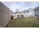 Landscaped backyard with raised garden beds and fence at 9004 Lisering Cir, Indianapolis, IN 46256