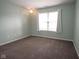 Bedroom with neutral walls and carpet flooring at 9004 Lisering Cir, Indianapolis, IN 46256