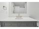 Modern bathroom vanity with white quartz countertop and gold fixtures at 901 N 700 W, Greenfield, IN 46140