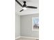 Bright bedroom with ceiling fan and view of yard at 901 N 700 W, Greenfield, IN 46140
