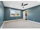 Well-lit bedroom with ensuite bathroom and backyard view at 901 N 700 W, Greenfield, IN 46140