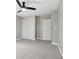 Spacious bedroom with double closets and ceiling fan at 901 N 700 W, Greenfield, IN 46140