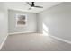 Bright bedroom with ceiling fan and window view at 901 N 700 W, Greenfield, IN 46140