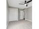 Spacious bedroom with double closets and ceiling fan at 901 N 700 W, Greenfield, IN 46140