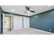 Bright bedroom featuring double closets and a ceiling fan at 901 N 700 W, Greenfield, IN 46140
