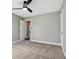 Bright bedroom with ceiling fan and access to hallway at 901 N 700 W, Greenfield, IN 46140