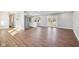 Open concept dining area with hardwood floors and French doors leading to the backyard at 901 N 700 W, Greenfield, IN 46140