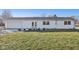 White ranch house with attached garage and back patio at 901 N 700 W, Greenfield, IN 46140