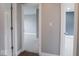 Hallway shows entrances to multiple rooms at 901 N 700 W, Greenfield, IN 46140
