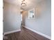 Bright hallway with hardwood floors and an open view into the kitchen at 901 N 700 W, Greenfield, IN 46140