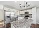Renovated kitchen, featuring granite island and stainless steel appliances at 901 N 700 W, Greenfield, IN 46140
