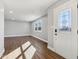 Spacious living room with hardwood floors and a large window at 901 N 700 W, Greenfield, IN 46140