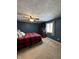 Main bedroom with king bed, dresser, and window at 975 Stonegate Rd, Greenwood, IN 46142