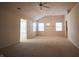 Bright dining room with large windows and ceiling fan at 11520 Coastal Way, Indianapolis, IN 46229