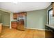 Galley kitchen with stainless steel appliances and wood cabinets at 1421 E New York St, Indianapolis, IN 46201