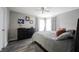 Bedroom with a bed, dresser, and gray walls at 15428 Wandering Way, Noblesville, IN 46060