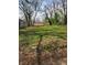 Spacious backyard with lawn and a new wooden fence in the background at 2018 N Dearborn St, Indianapolis, IN 46218