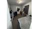 Bedroom with bed, dresser, and closet at 2018 N Dearborn St, Indianapolis, IN 46218