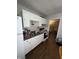 White kitchen cabinets and appliances at 2018 N Dearborn St, Indianapolis, IN 46218