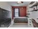 Small bedroom with a bed and built-in shelving at 2114 St Clifford Dr, Indianapolis, IN 46239