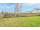 Grass backyard with wooden fence at 2716 Redland Ln, Indianapolis, IN 46217