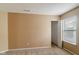 Simple bedroom with neutral walls and carpet at 2716 Redland Ln, Indianapolis, IN 46217