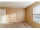Bright bedroom with neutral walls and carpet at 2716 Redland Ln, Indianapolis, IN 46217