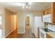 View of kitchen, hallway, and garage entry from the kitchen at 2716 Redland Ln, Indianapolis, IN 46217