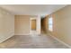 Bright living room featuring neutral walls and carpet at 2716 Redland Ln, Indianapolis, IN 46217