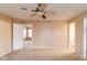 Main bedroom with ceiling fan and access to bathroom at 2716 Redland Ln, Indianapolis, IN 46217