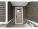 Beige front door with a single window pane at 2741 Green Valley Dr, Lebanon, IN 46052