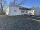 Quaint bungalow-style home with a covered porch and nice lawn at 3305 E 30Th St, Indianapolis, IN 46218