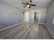Spacious living room featuring light gray walls and wood-look floors at 3305 E 30Th St, Indianapolis, IN 46218