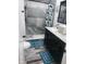 Modern bathroom with double vanity, walk-in shower, and stylish tile at 34 Iowa St, Indianapolis, IN 46225