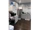 Gray kitchen cabinets, stainless steel appliances, granite countertops at 34 Iowa St, Indianapolis, IN 46225