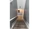 Carpeted staircase leading to the upper level of the home at 34 Iowa St, Indianapolis, IN 46225