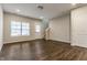 Spacious living room with wood flooring and neutral walls at 3627 Thomas Jefferson St, Westfield, IN 46074