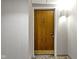 Simple apartment entry with wood door and light walls at 4000 N Meridian St # 3A, Indianapolis, IN 46208