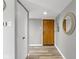 Apartment entry with white closet doors and wood floor at 4000 N Meridian St # 3A, Indianapolis, IN 46208