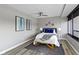 Bright bedroom featuring wood flooring and ample natural light at 4000 N Meridian St # 3A, Indianapolis, IN 46208