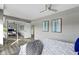 Comfortable bedroom with wood floors and mirrored closet doors at 4000 N Meridian St # 3A, Indianapolis, IN 46208
