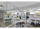 Modern dining area with white table and four chairs at 4000 N Meridian St # 3A, Indianapolis, IN 46208