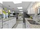 Bright kitchen boasting granite countertops and stainless steel appliances at 4000 N Meridian St # 3A, Indianapolis, IN 46208
