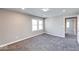 Cozy bedroom with a carpeted floor and lots of light at 4014 N Capitol Ave, Indianapolis, IN 46208
