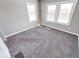 Cozy bedroom with a carpeted floor and lots of light at 4014 N Capitol Ave, Indianapolis, IN 46208