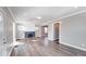 Bright living room featuring hardwood floors, a decorative fireplace, and ample natural light at 4014 N Capitol Ave, Indianapolis, IN 46208