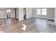 Open-concept living room with hardwood floors and neutral color palette, perfect for entertaining guests at 4014 N Capitol Ave, Indianapolis, IN 46208
